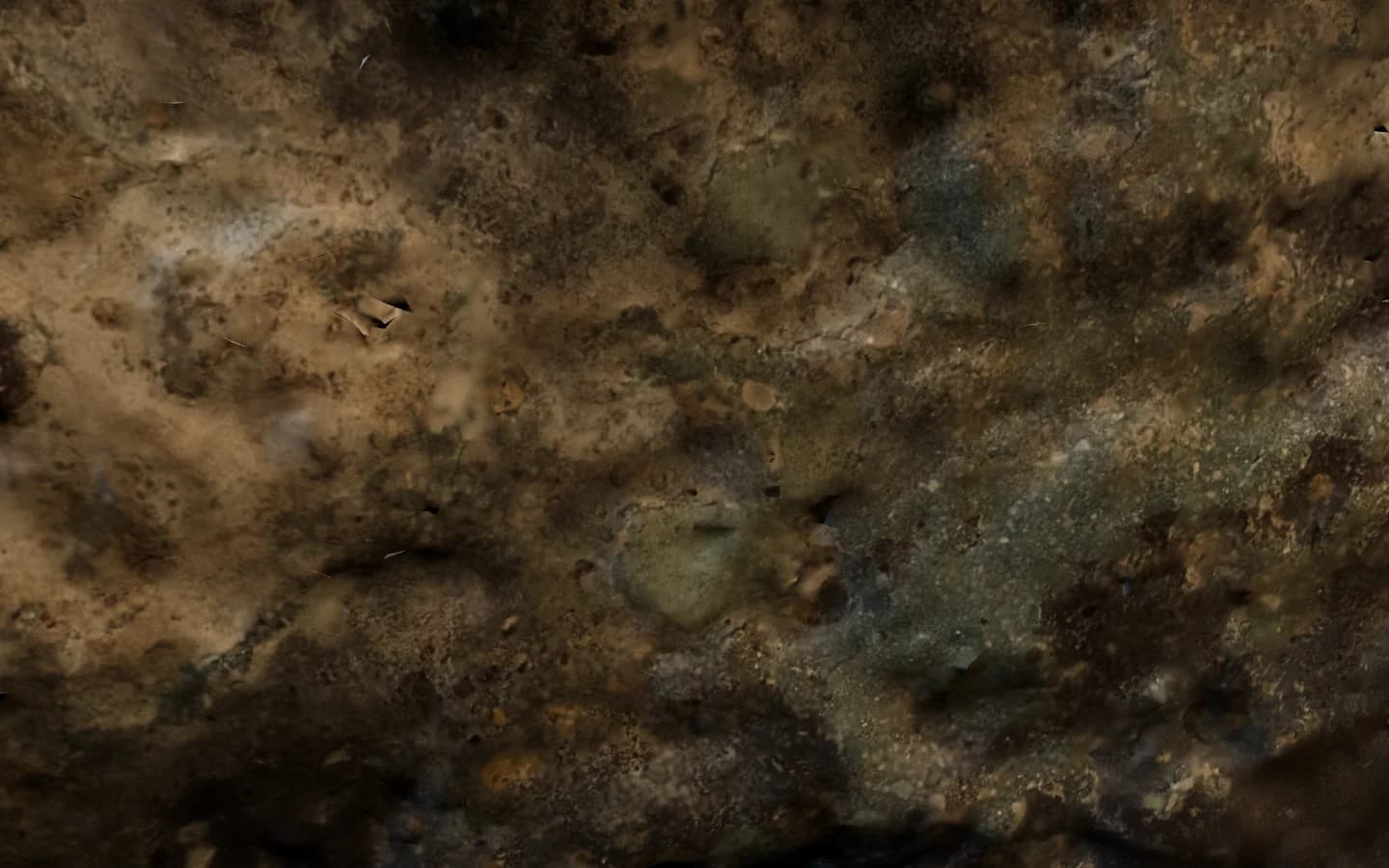 A weathered bronze surface filling the frame, mottled with verdigris and corrosion in green, rust and ochre.
