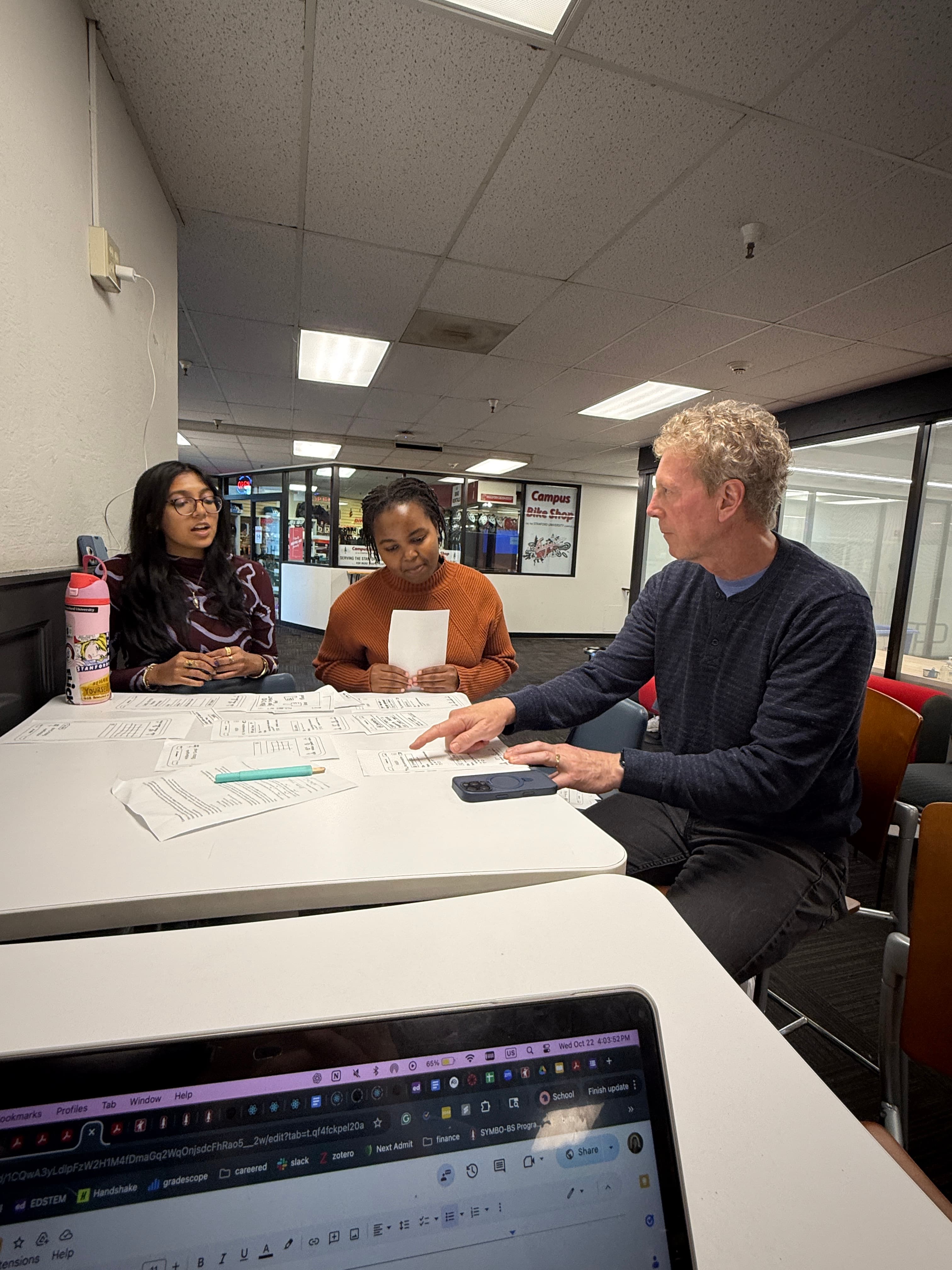 User testing the lo-fi Stitch prototype with Brain, hair salon owner
